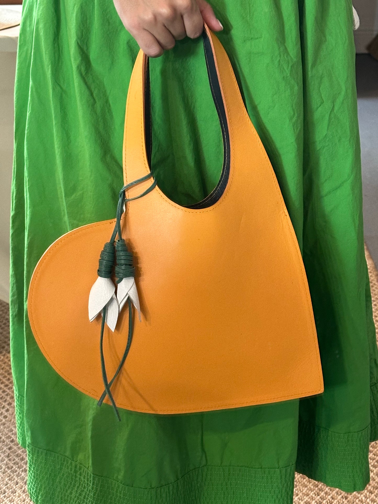 Heart shaped leather handbag